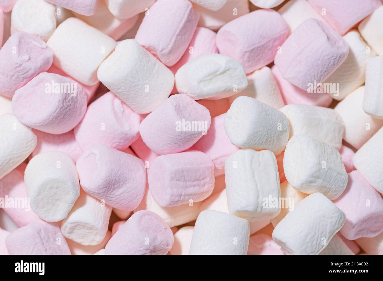 Texture sfondo Marshmallow in colori pastello rosa e bianco. Foto Stock