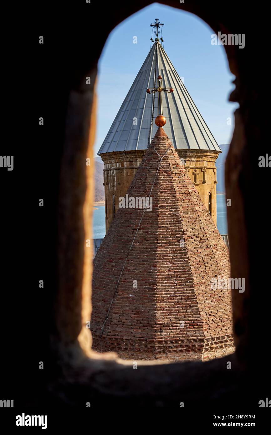 Gergeti Trinity Church in Georgia all'alba Foto Stock