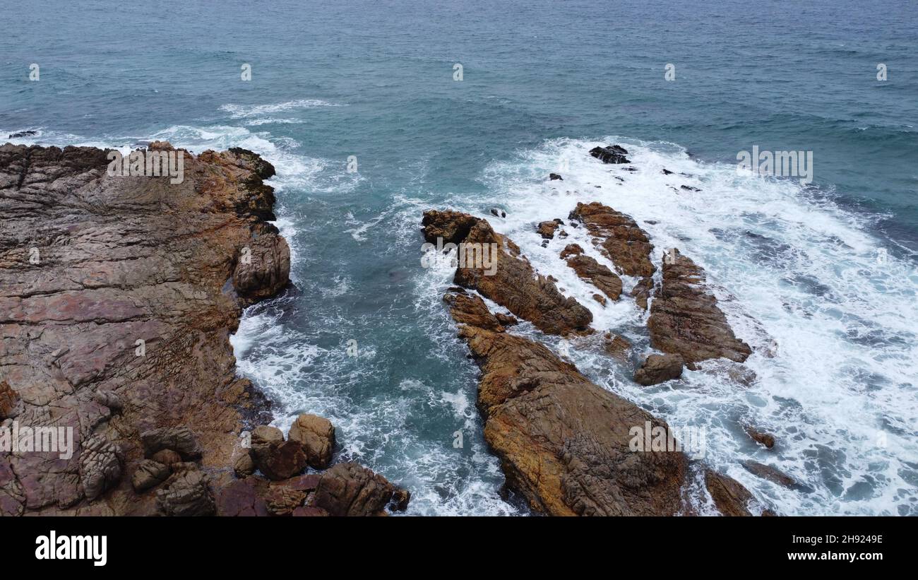 Dove il mare incontra la terra Foto Stock