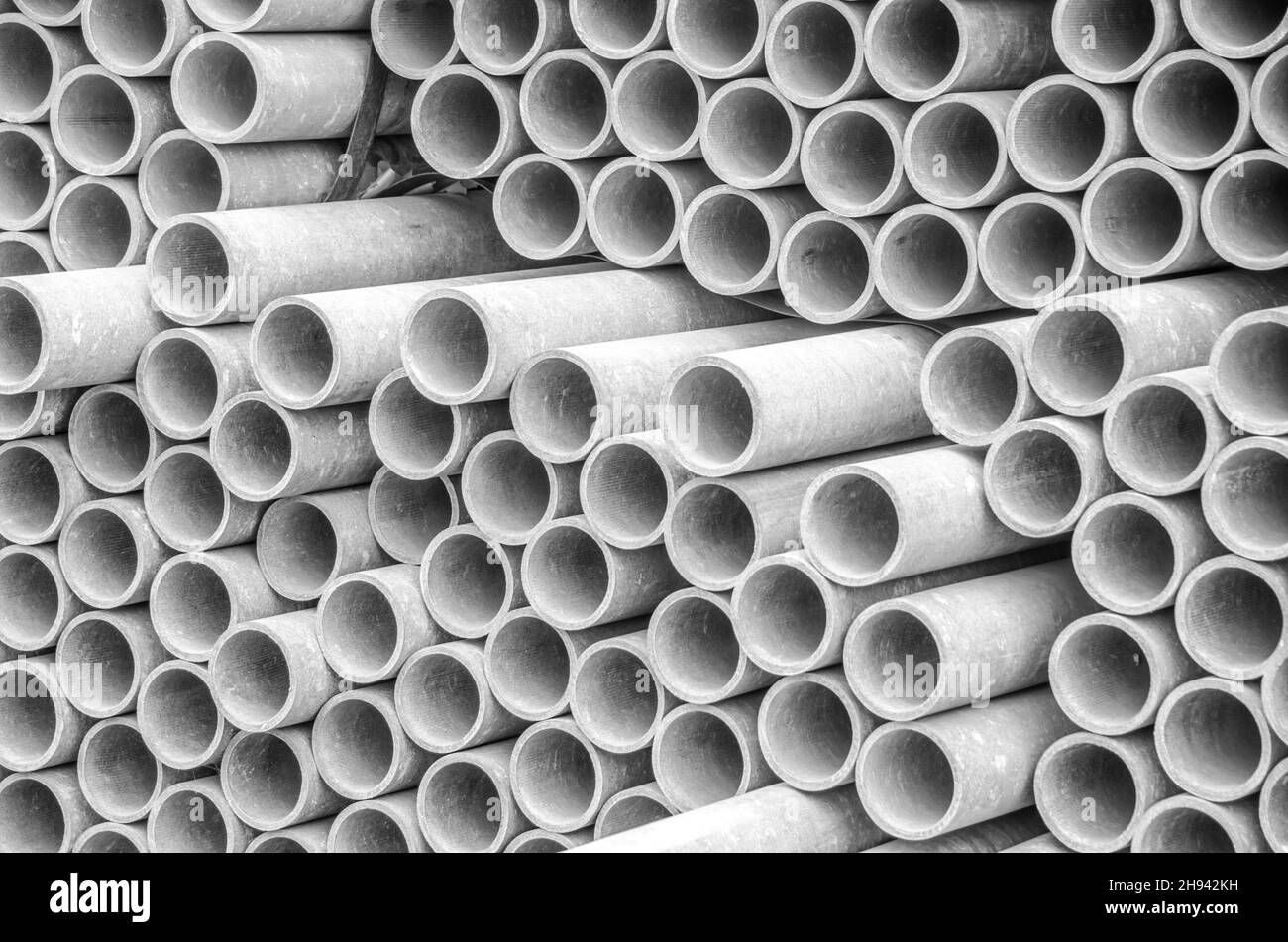 Tubi di cemento di amianto usati per costruzione di drenaggio. Texture per  lo sfondo Foto stock - Alamy