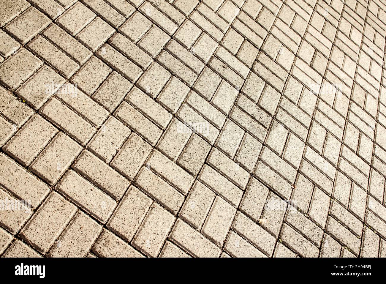 Vista diagonale del pavimento con strato di pietra geometrica. Foto Stock