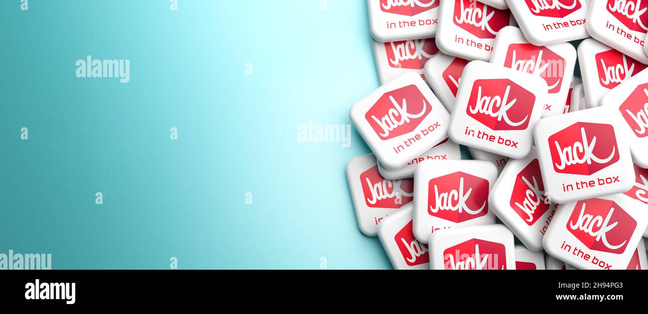 Logo della catena americana di ristoranti fast food Jack in the Box su un mucchio su un tavolo. Spazio di copia. Formato banner Web. Foto Stock