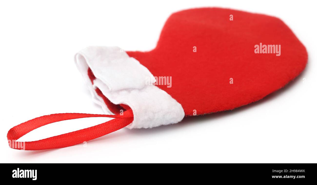 Calza di Natale su sfondo bianco Foto Stock