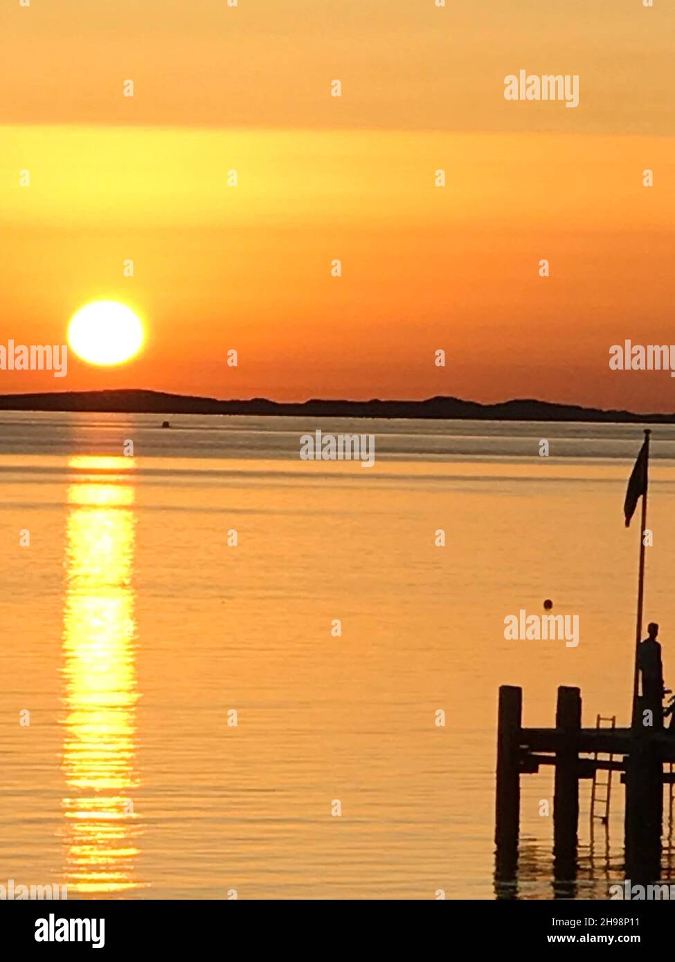 Sonnenuntergang an der Nordsee mit Blick auf Sylt Foto Stock
