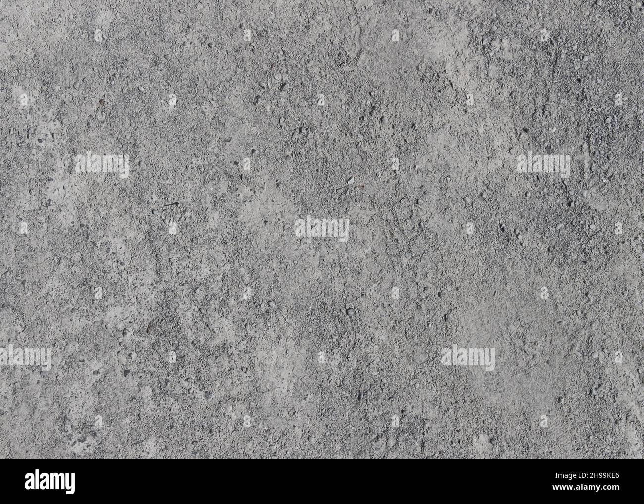 Texture di pietra naturale. Marmo grigio, superficie opaca, lastra italiana, granito, struttura avorio, piastrelle in ceramica per pavimenti e pareti. Porcellana rustica naturale Foto Stock