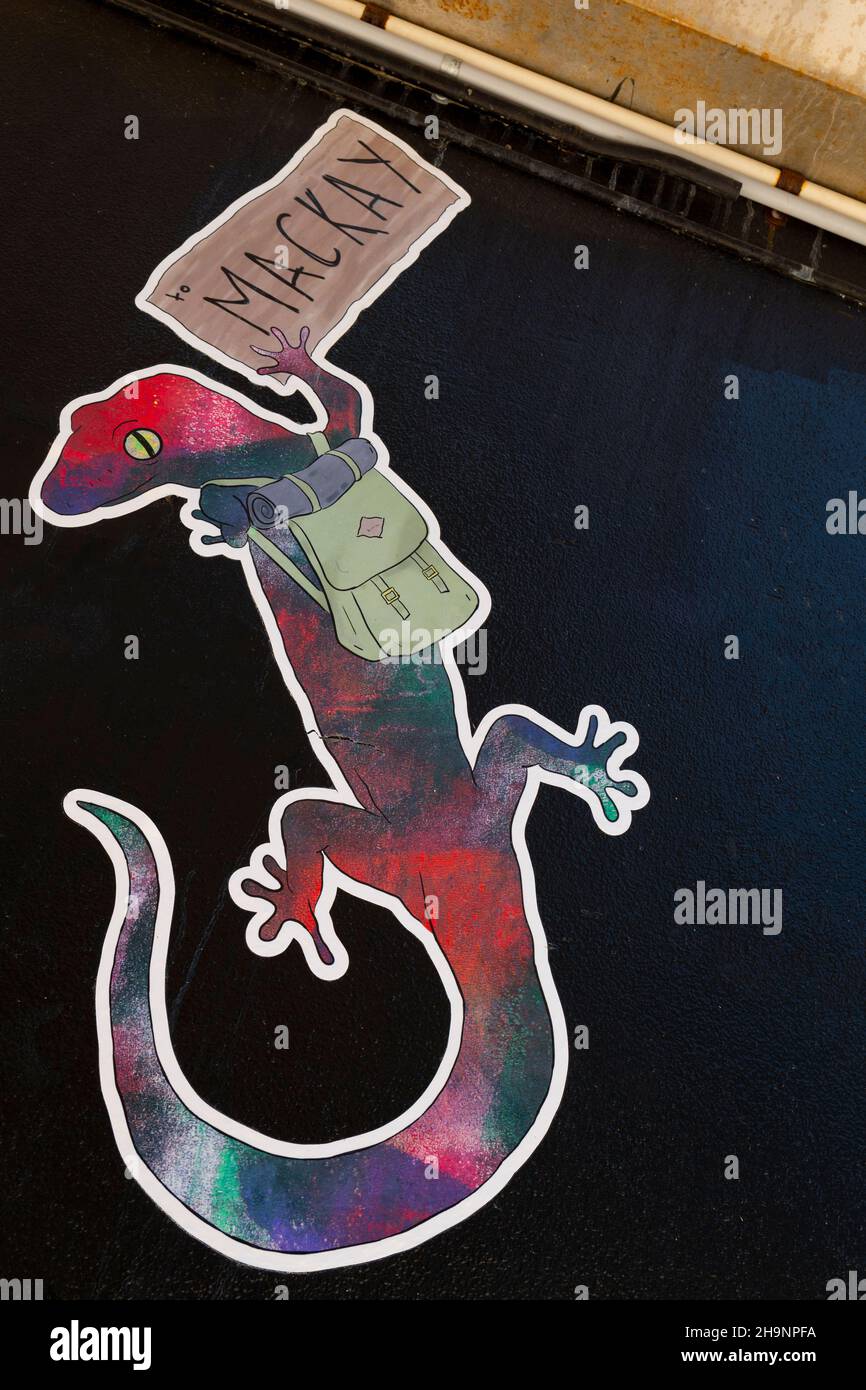 street art di un gecko con un cartello che vi dà il benvenuto a Mackay Foto Stock