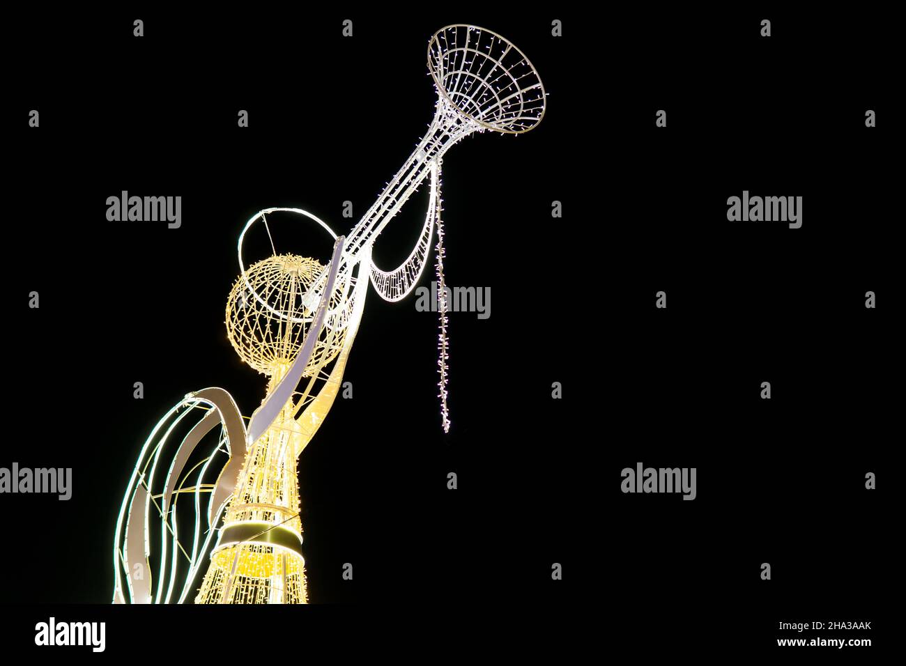 Personaggi natalizi realizzati con luci Foto Stock