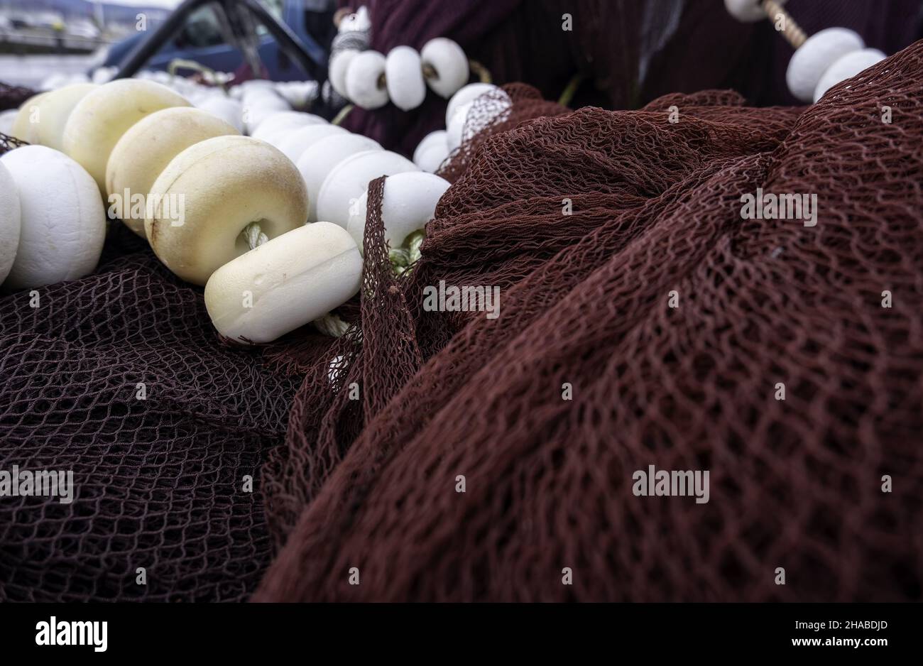 Reti da pesca nei porti marittimi, nell'industria e nel lavoro Foto Stock