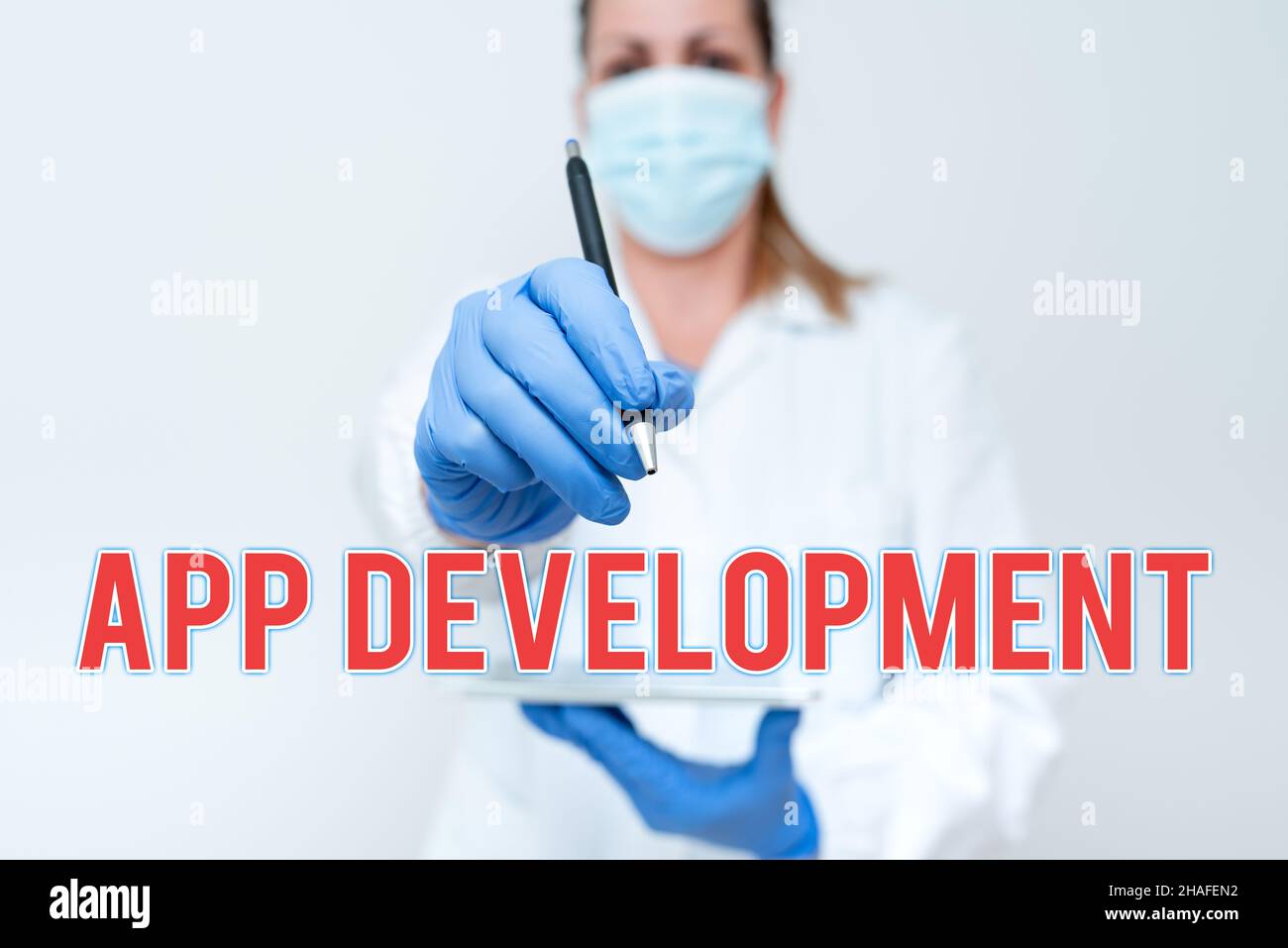 Didascalia di testo che presenta lo sviluppo dell'app. Panoramica aziendale servizi di sviluppo per esperienze mobili e web straordinarie che dimostrano la techologia medica Foto Stock