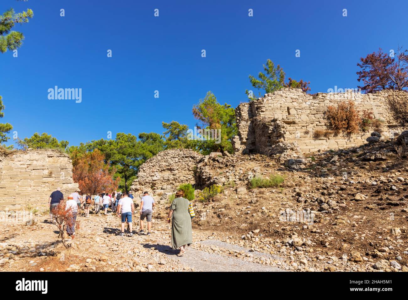 Ourists visitare i resti greco-romani della città di Seleucia (anche conosciuta come Seleukia) nelle vicinanze di località di Side, Turchia. Foto Stock