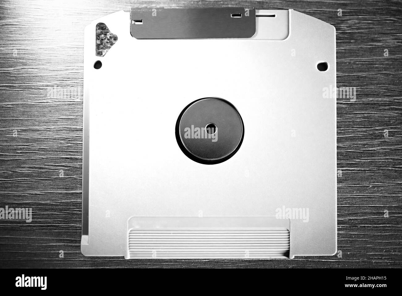 Disco magneto-ottico vintage sfondo di archiviazione del computer Foto Stock