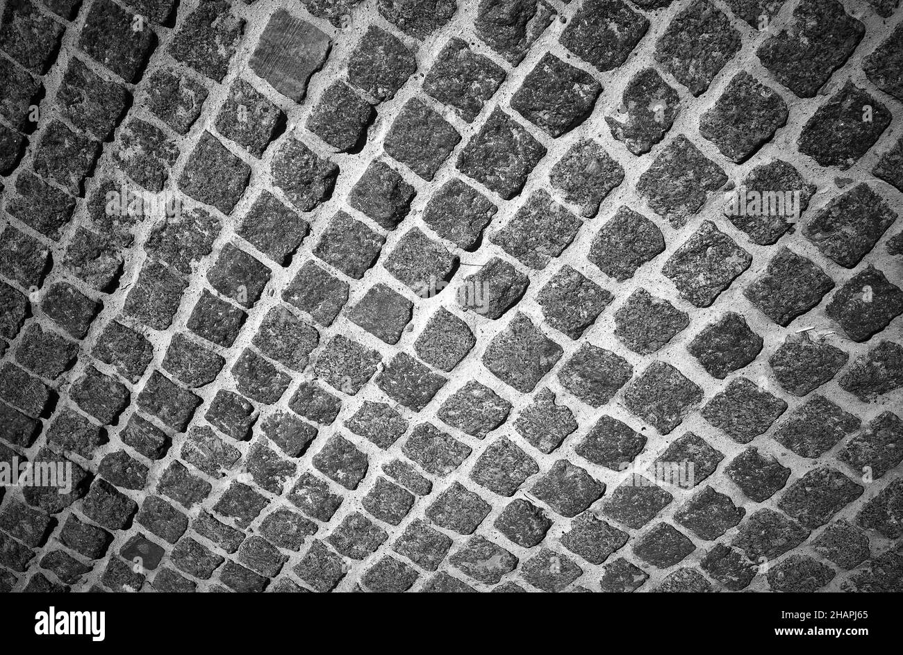 Pavimentazione stradale in muratura diagonale Foto Stock