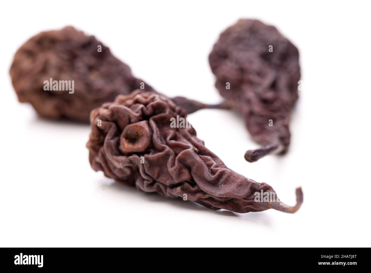 frutta secca, pera, pera secca, marrone, frutta, asciugi, asciugò, uno, solo, piegando, sfondo, cibo, tipico, tradizionale, sfondo bianco, bianco, dietro, Foto Stock