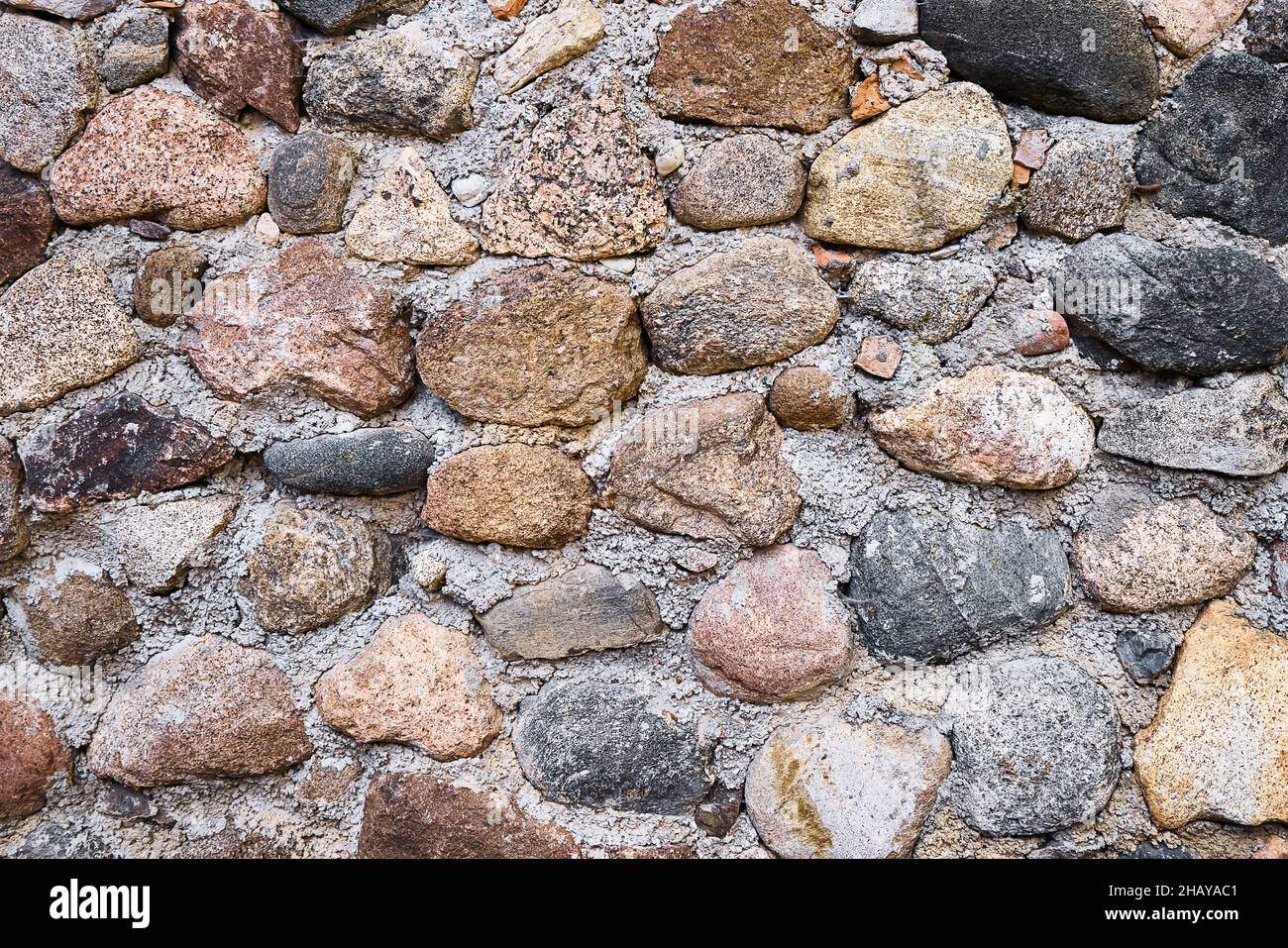 Vecchio muro di ciottoli. Sfondo grunge perfetto. Spazio di copia per il testo. Foto Stock
