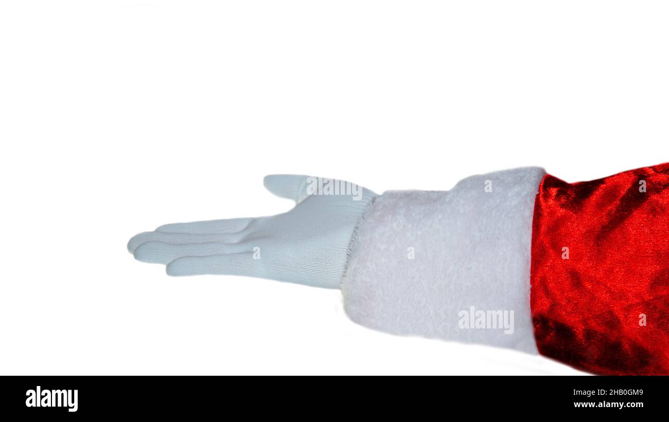 Una mano in un guanto di Babbo Natale su sfondo bianco. Un gesto della mano. Capodanno, Natale. Gesti. Vacanza, positiva. Isolare. Foto Stock