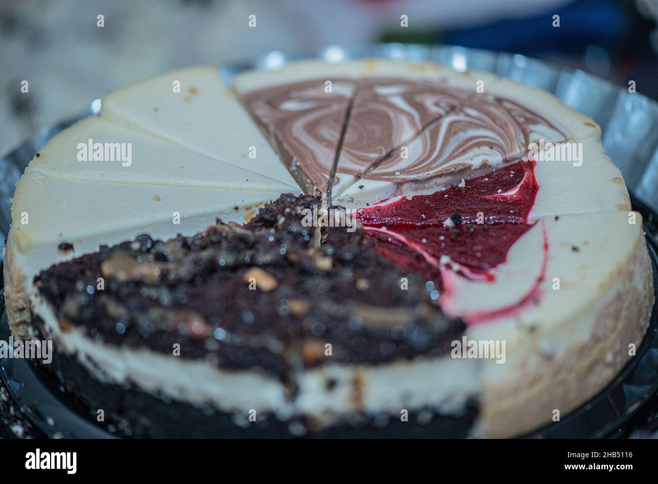 Piatto di Cheescake con sapori assortiti Foto Stock