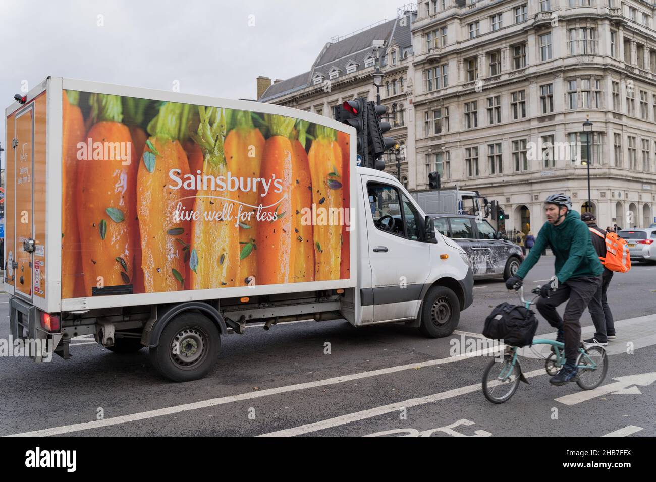 Il furgone di consegna di sainsburys visto nella città di Westminster Londra Inghilterra Foto Stock