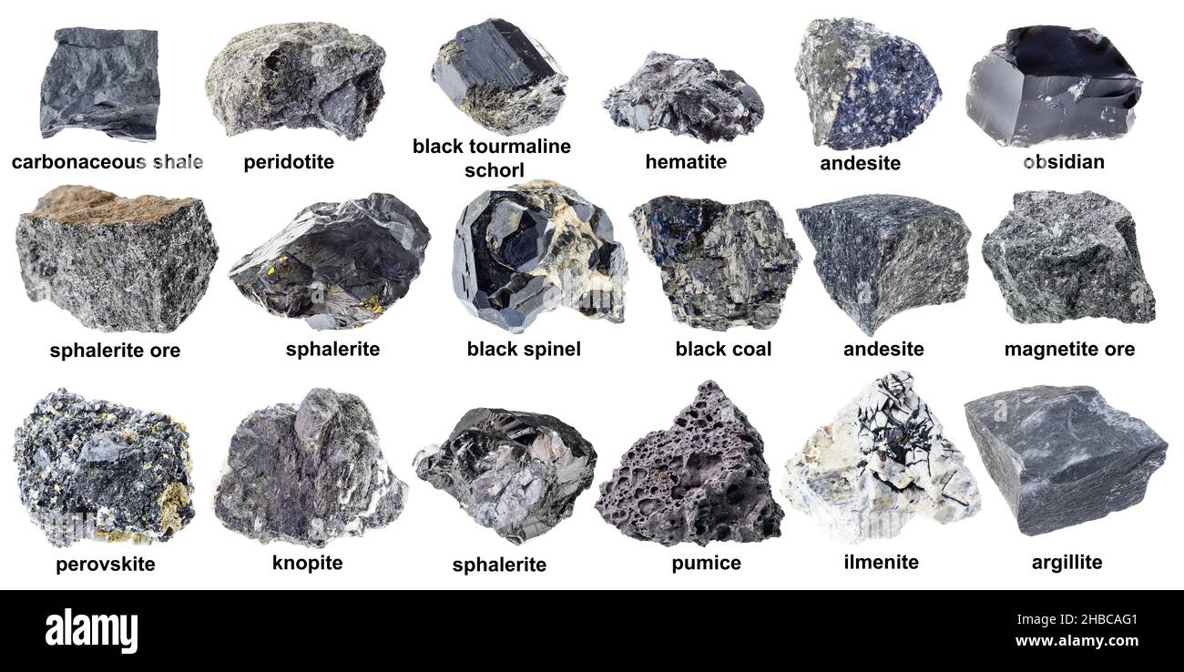 set di varie rocce scure non lucidate con nomi (cromite, sphalerite,  magnetite, basalto, nefelina sienite, molibdenite, ossidiana, perovskite,  emati Foto stock - Alamy