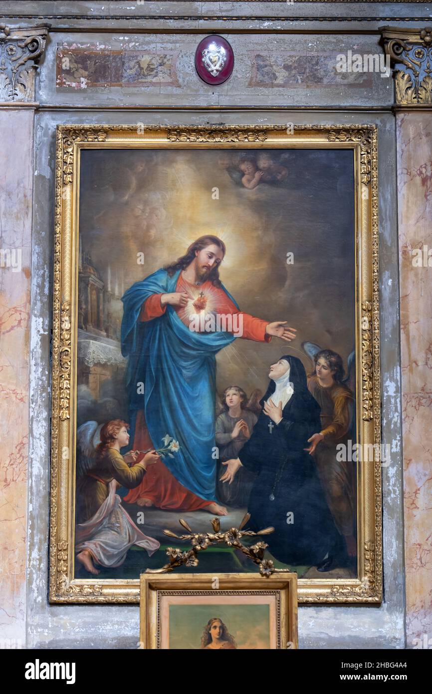 Roma, Italia, Santi Vincenzo e Anastasio a Trevi (Santi Vincenzo e Anastasio a Trevi), dipinto di Cristo che mostra il suo Sacro cuore a Santa Margherita M. Foto Stock