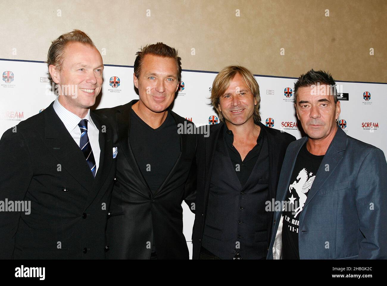 Gary Kemp, Martin Kemp, Steve Norman e John Keeble di Spandau Ballet arrivano al primo Stalker all'Empire Cinema, Leicester Square, Londra Foto Stock