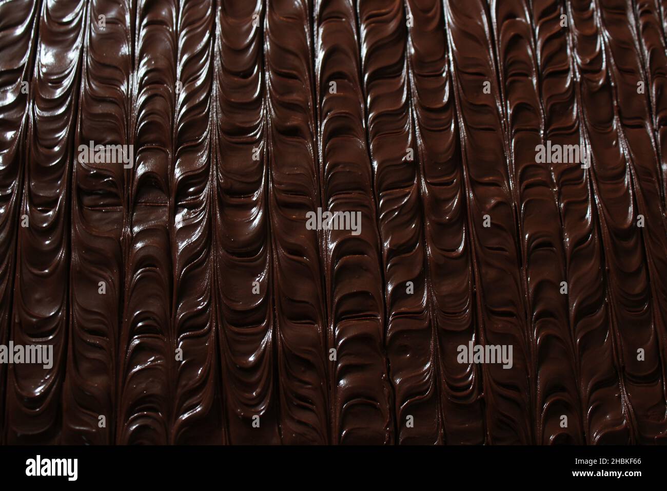 Un modello su un dessert al cioccolato Foto Stock