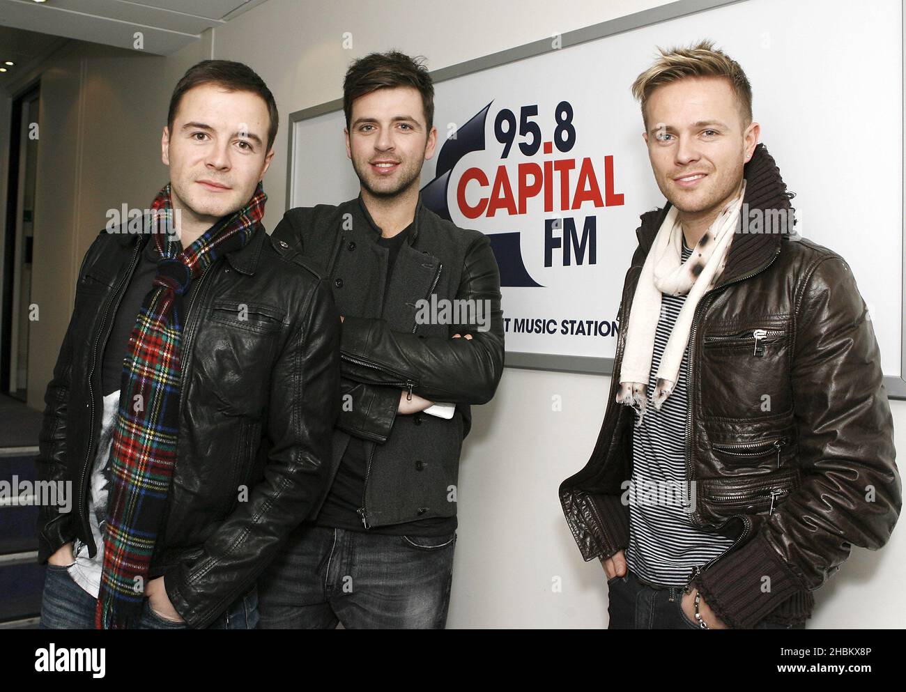 Shane Filan, Mark Feehily e Nicky Byrne di Westlife al 95,8 Capital FM radio, Londra. Foto Stock