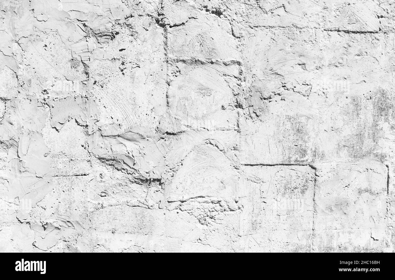 Bianco antico muro di pietra, frontale foto di sfondo texture Foto Stock