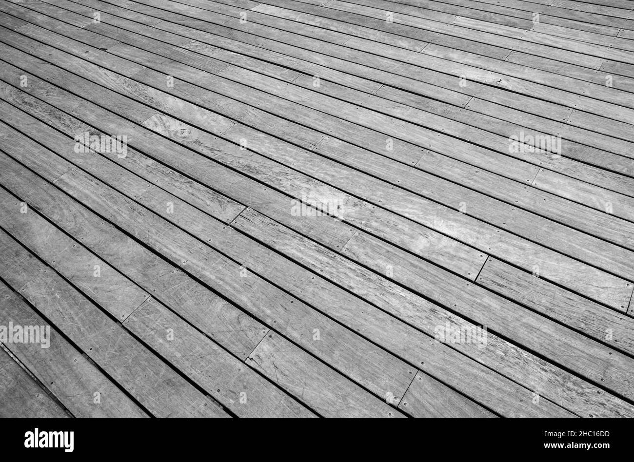 Pavimento in legno grigio, foto di sfondo con messa a fuoco selettiva ed effetto prospettico Foto Stock