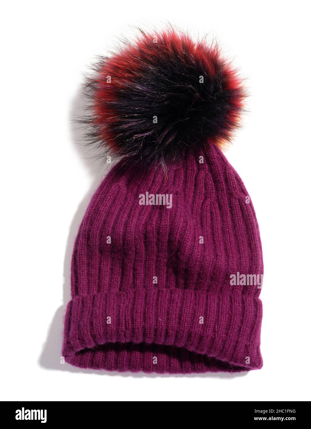 Un berretto in lana con un morbido top. Un cappello di lana. Foto Stock