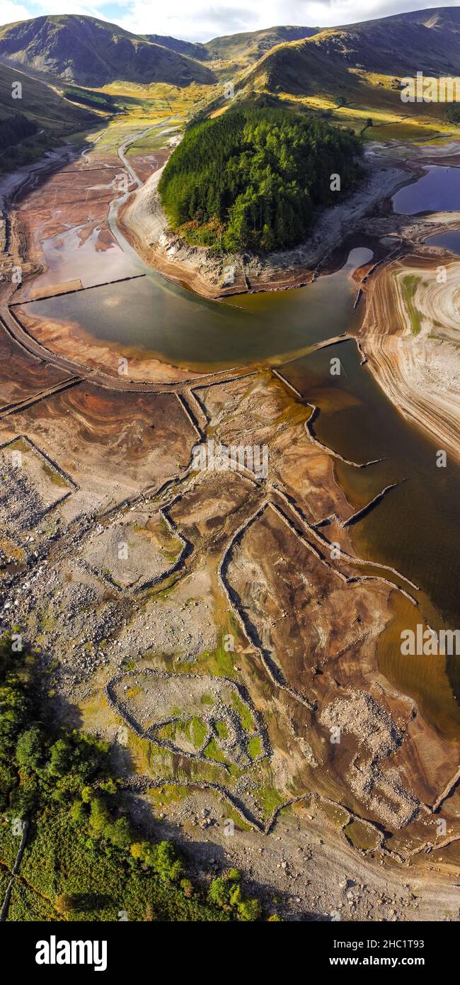 Il villaggio di Mardale Green, allagato nel 1935 per fornire acqua a Manchester, riemergendo dalle profondità del serbatoio di Haweswater durante un periodo di siccità Foto Stock
