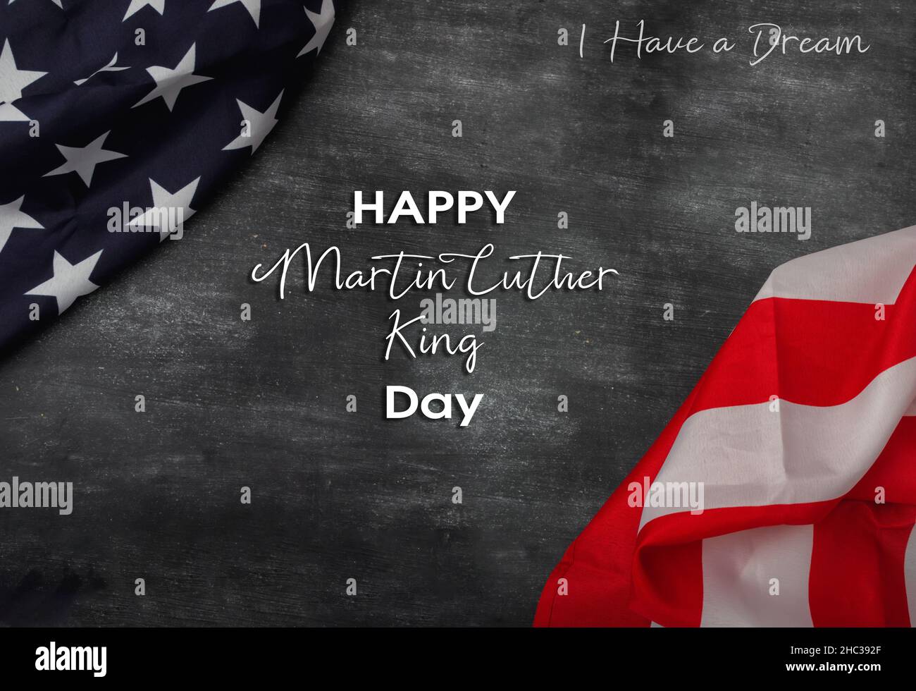 Happy Martin Luther King Jr. Giorno - ho un testo da sogno in gesso su una lavagna. bandiera americana su lavagna. Foto Stock