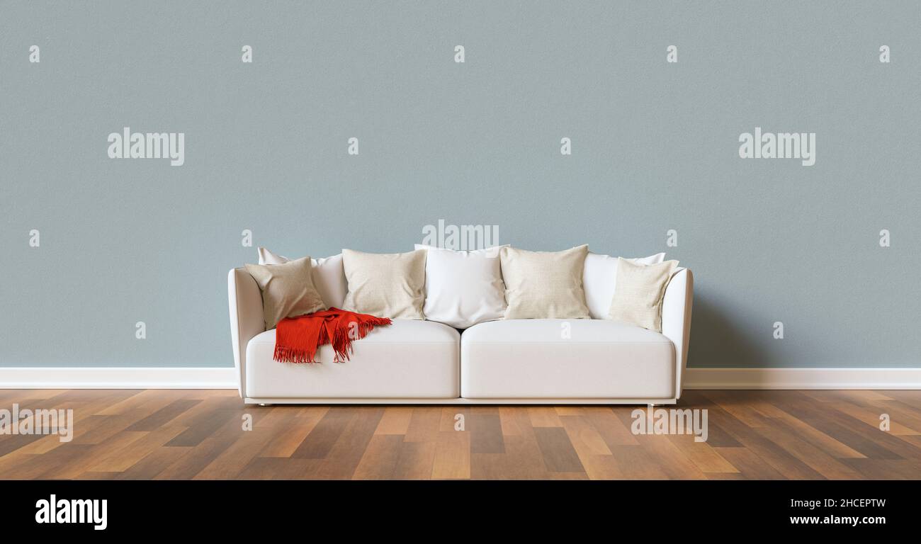 Divano su una parete blu in soggiorno con spazio per canva Foto Stock