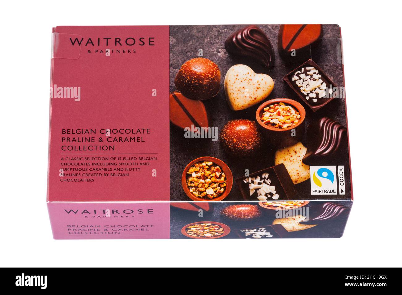 Collezione belga di pralina al cioccolato e caramello di Waitrose una classica selezione di 12 cioccolatini belgi ripieni su sfondo bianco - Fairtrade Foto Stock