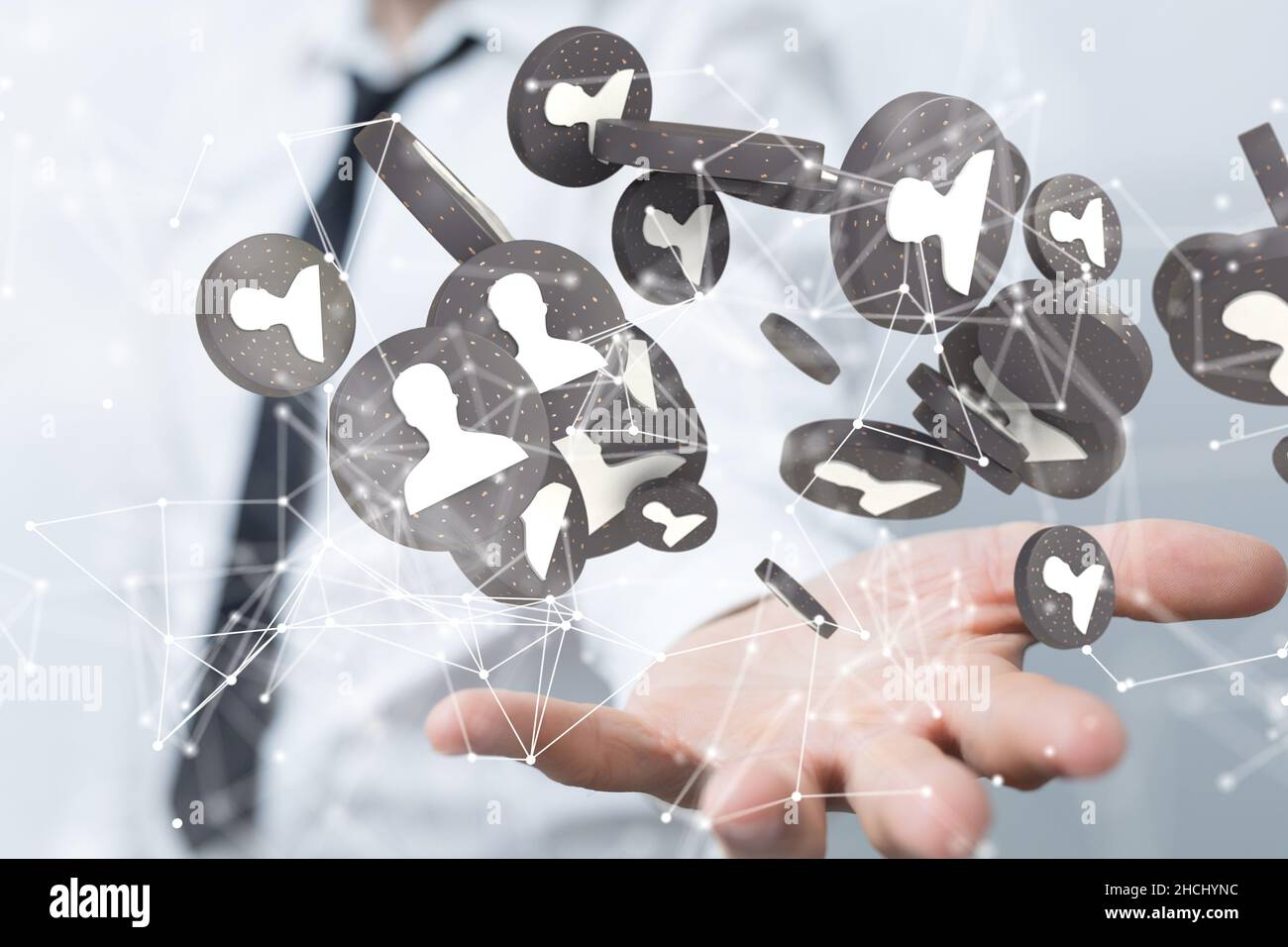 E le comunicazioni di sfondo tematico con icone digitali fluttuanti davanti alle mani Foto Stock