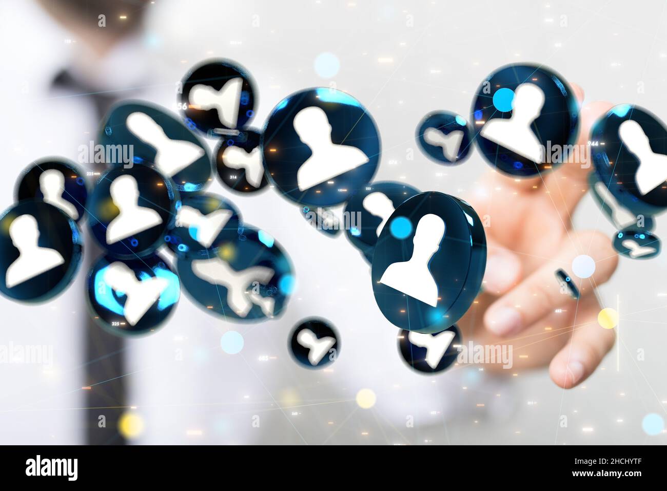 E le comunicazioni di sfondo tematico con icone digitali fluttuanti davanti alle mani Foto Stock