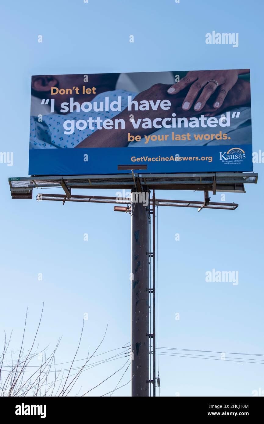 Lansing, Kansas. Avrei dovuto essere vaccinato in ufficio di cartellone sanitario che avverte le persone di non attendere fino a tardi. Foto Stock