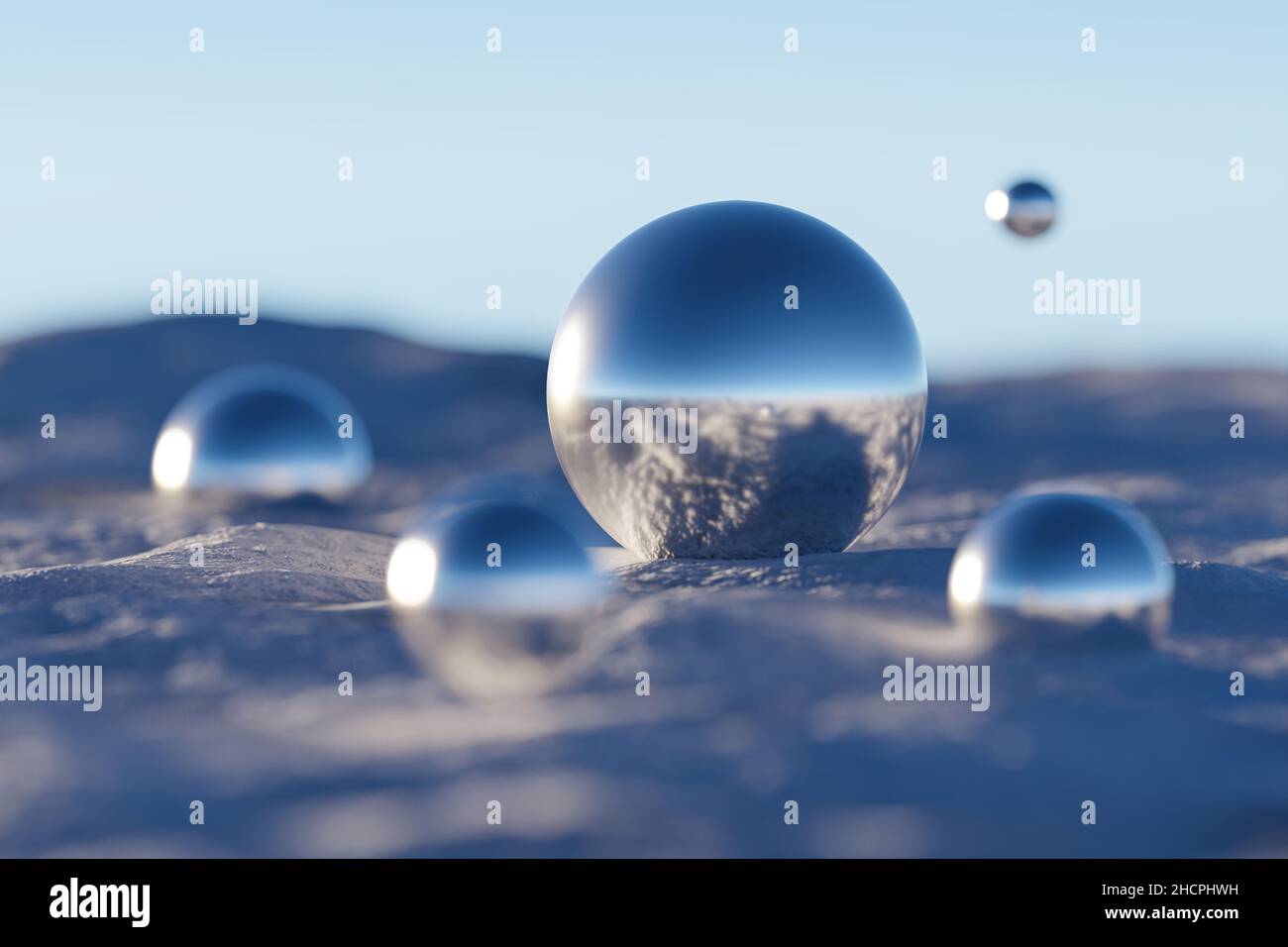 Abstact sfere di metallo sulla neve in giorno di sole. 3D rendering. Foto Stock