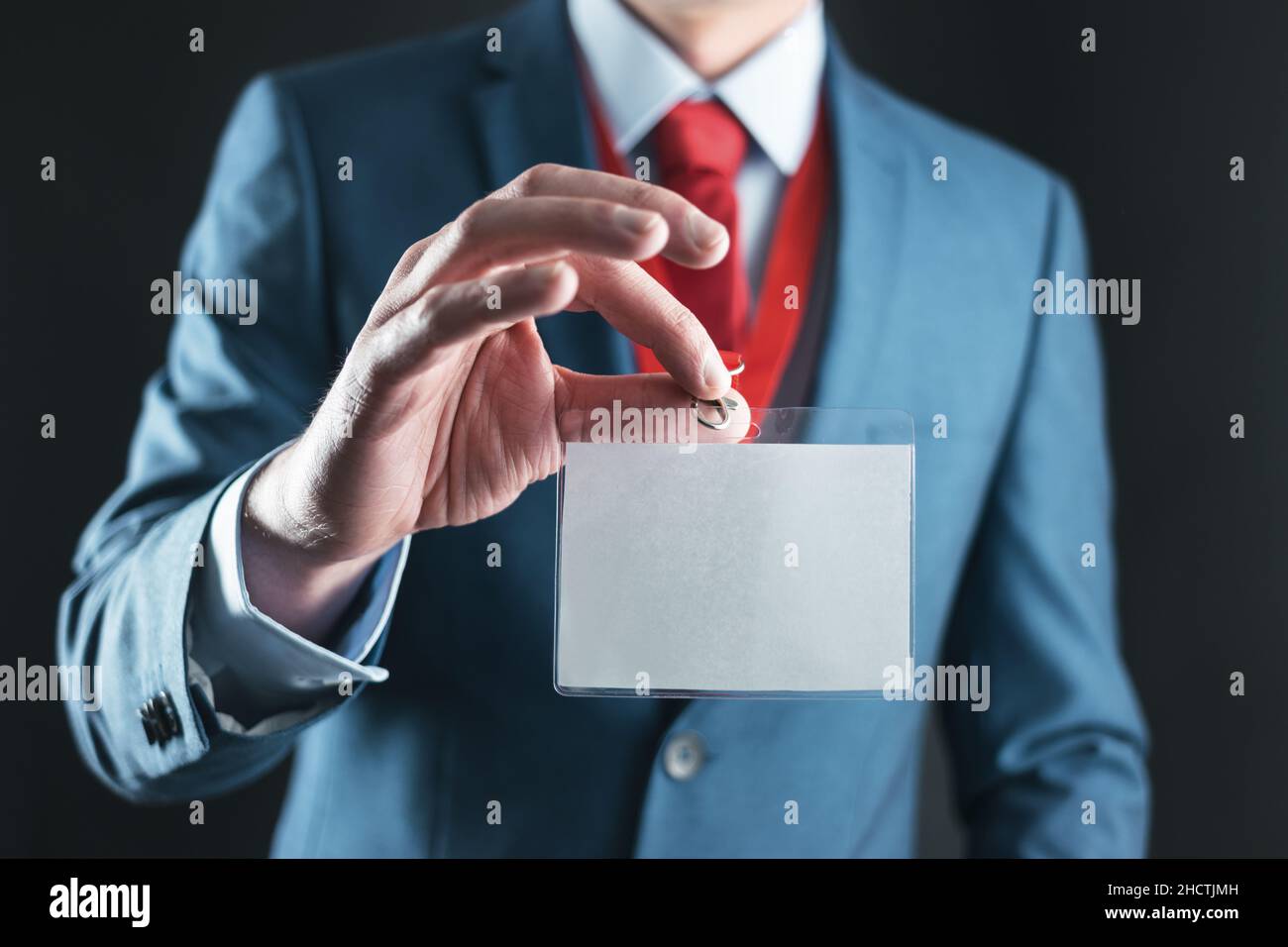 Businessman con identità di sicurezza in bianco Foto Stock