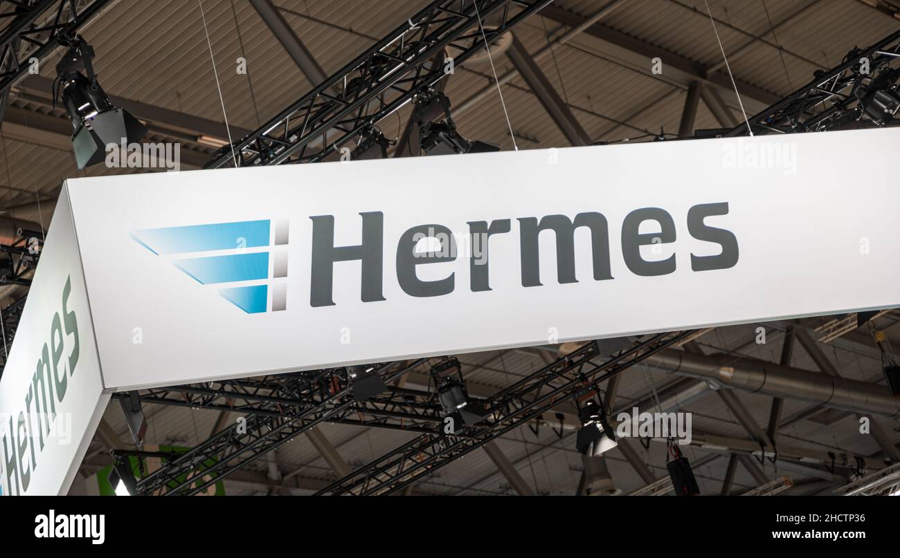Il logo del marchio 'Hermses'. Hermes è il più grande fornitore di servizi logistici post-indipendenti della Germania per le consegne a clienti privati. Foto Stock