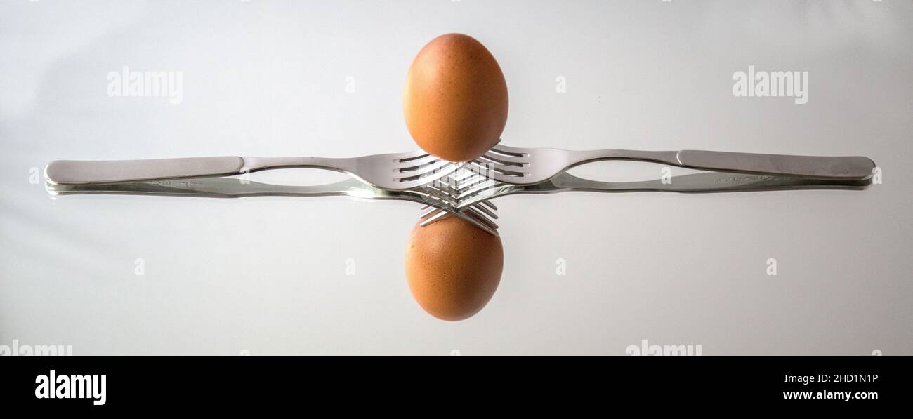 Uova e forcelle Foto Stock