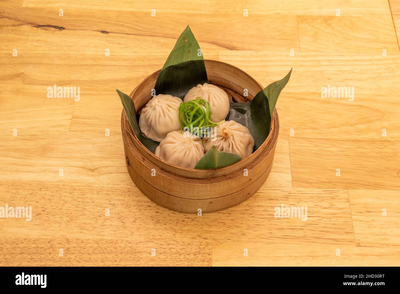 Xiaolongpao, un gnocchi stufati di tipo baozi, è una specialità culinaria molto comune della Cina orientale, tra cui Shanghai e Wuxi. Questi ciambelle stufati sono noi Foto Stock