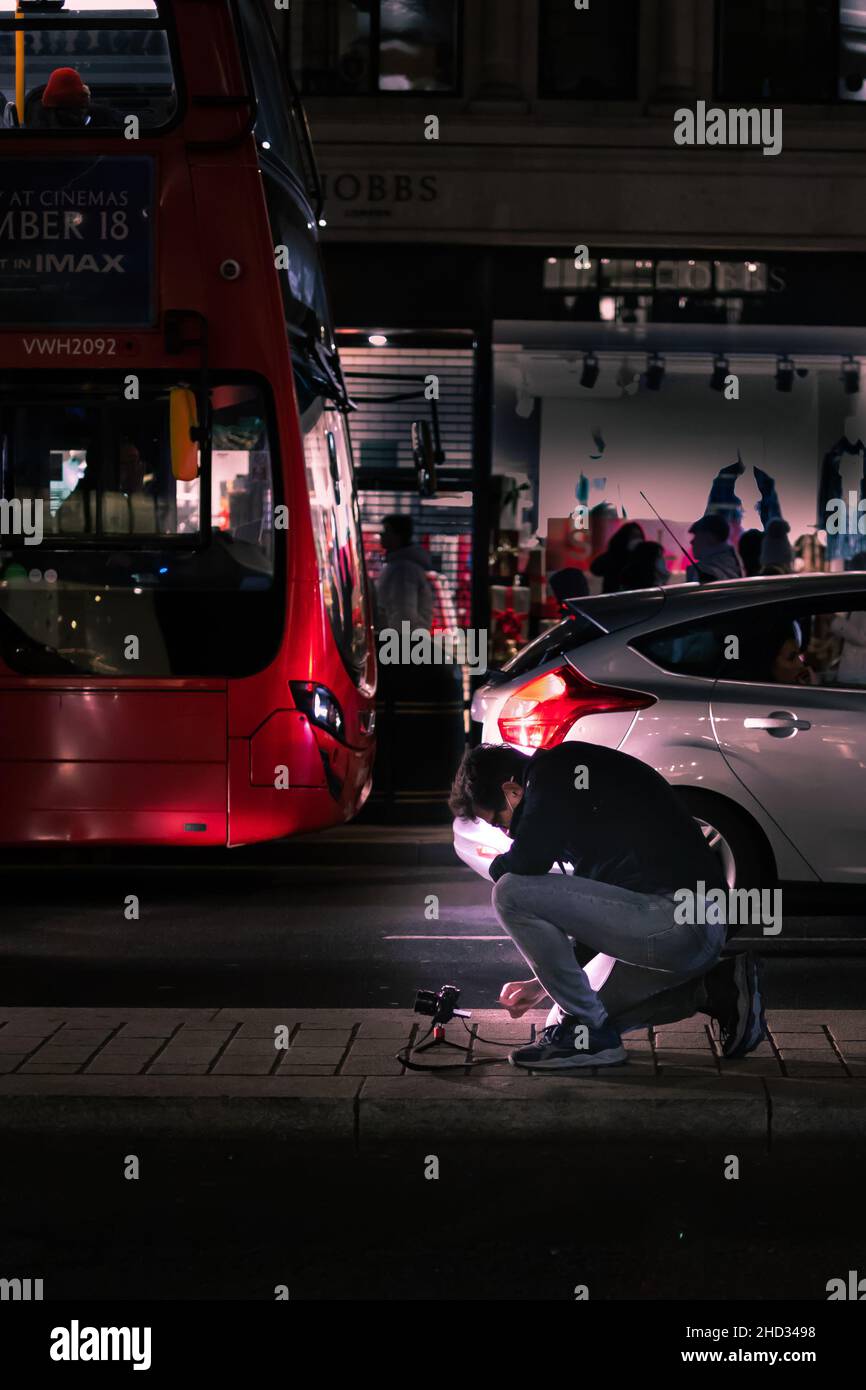 Fotografo a Regent Street Londra Foto Stock