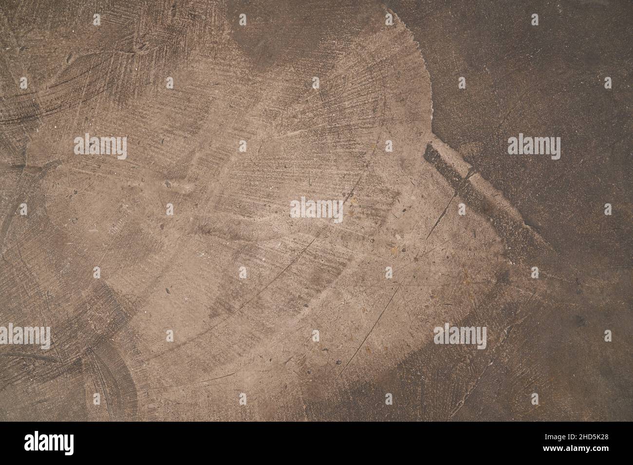 Calcestruzzo senza cuciture marrone scuro. Sfondo muro di pietra. Foto di alta qualità Foto Stock