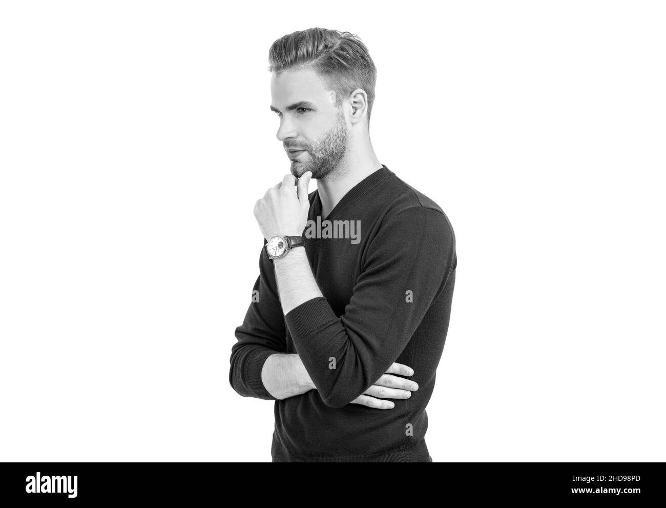 Il barbiere è tornato. L'uomo bello tocca il mento non rasato. Barbiere. Cura del corpo maschile. Barbiere Foto Stock