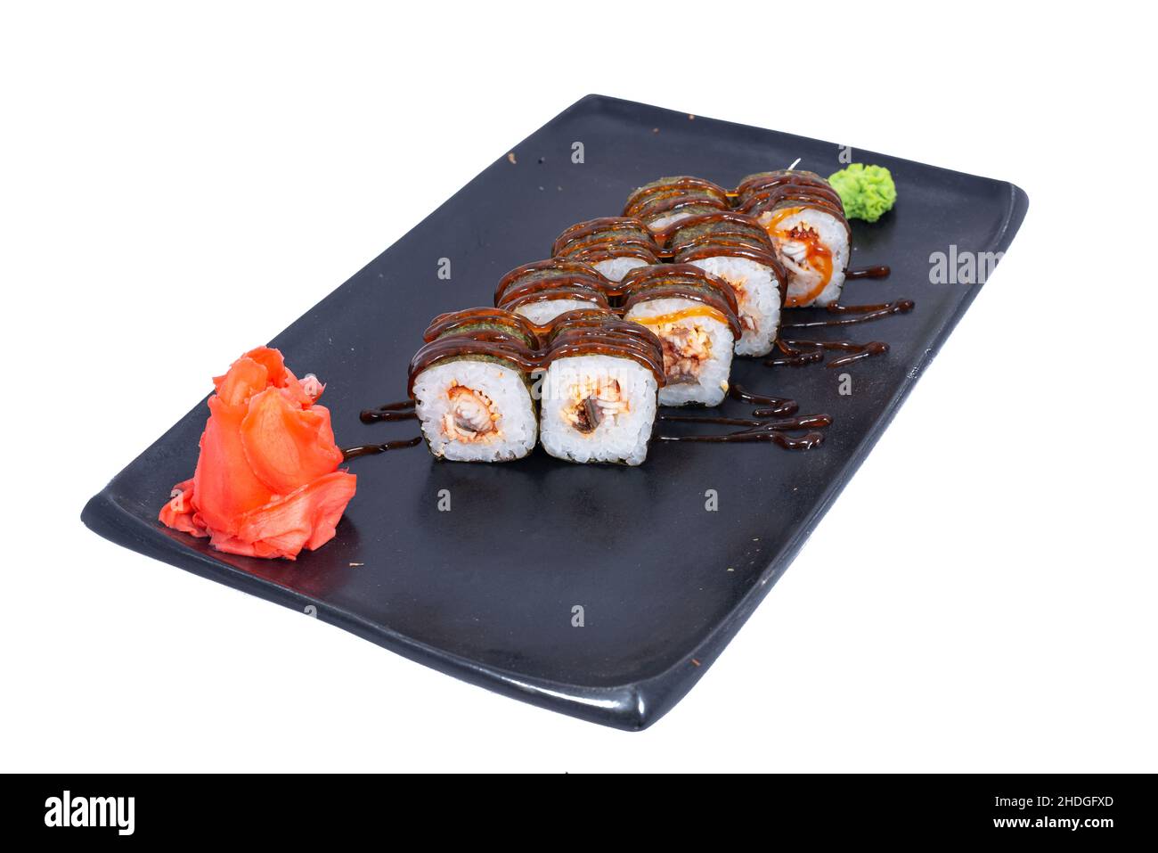 Cucina giapponese - Sushi Roll con gamberi e conger, avocado, Tobiko e formaggio. Sushi roll tempura, cucina giapponese Foto Stock