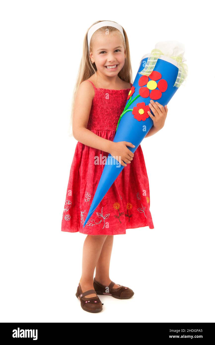 ragazza, primo giorno scolastico, sacchetto conico di dolci, ragazze, primo giorno scolastico Foto Stock
