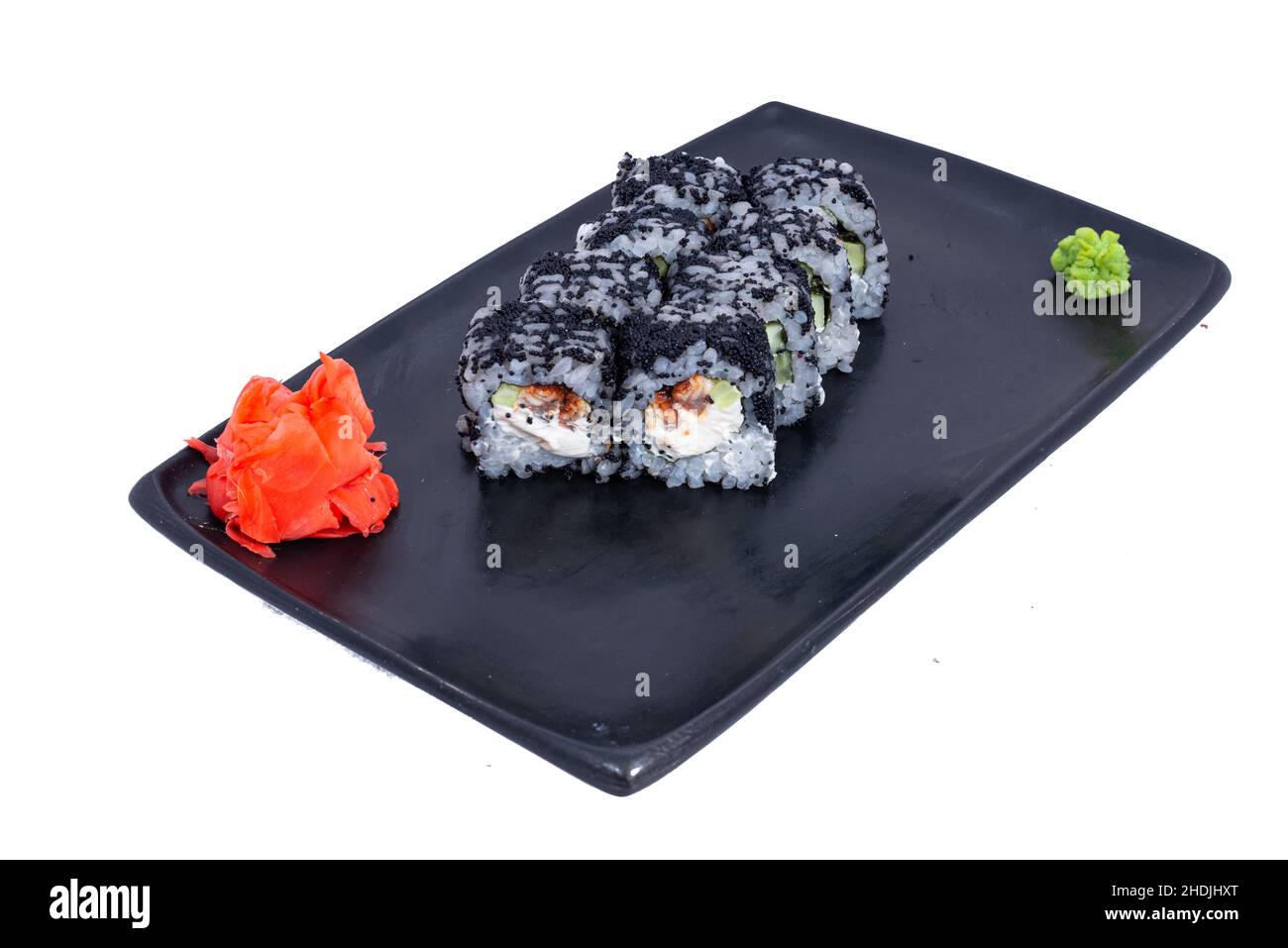 Cucina giapponese - Sushi Roll con gamberi e conger, avocado, Tobiko e formaggio. Sushi roll tempura, cucina giapponese Foto Stock
