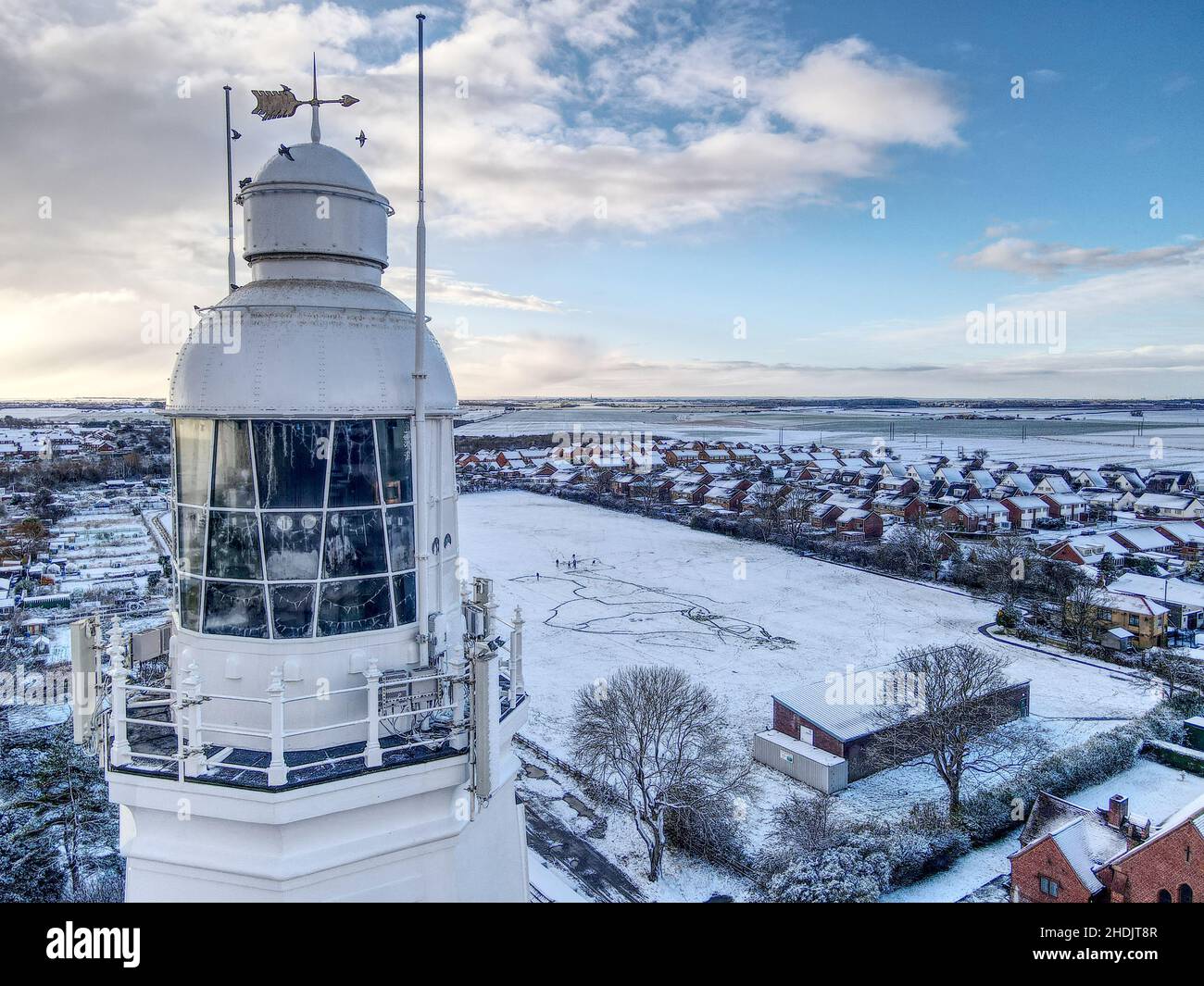 Scena della neve sul faro Foto Stock