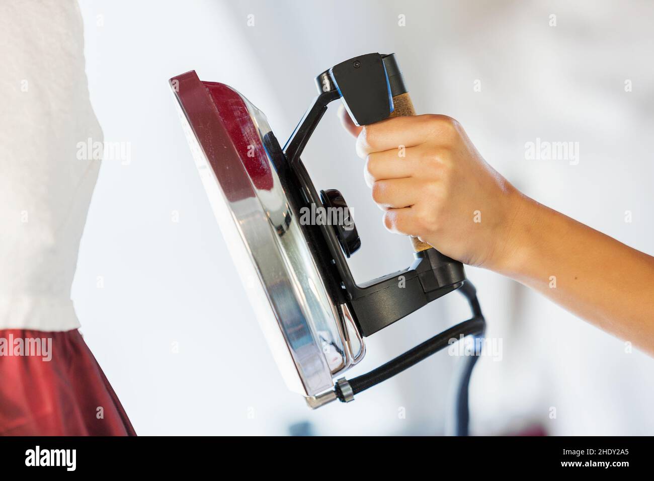 abbigliamento, ferro da stiro, sartoria, stiratura, ferro da stiro, su misura Foto Stock