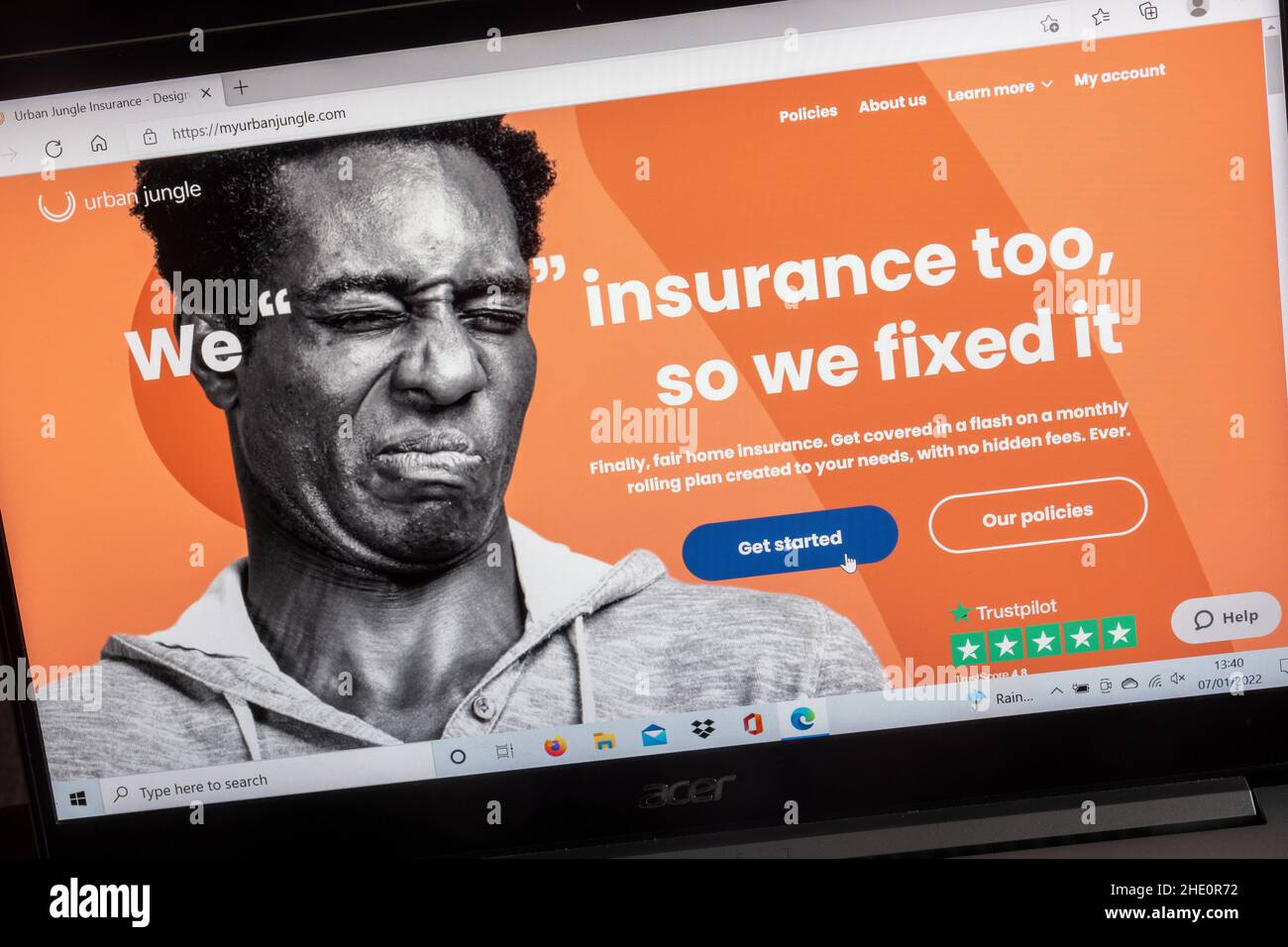 Sito web di Urban Jungle Insurance Company su uno schermo di computer portatile. Foto Stock